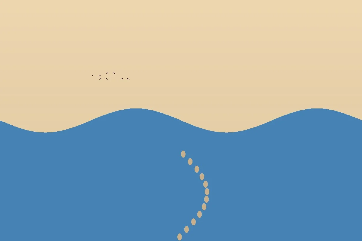Footprints in sand leading to the ocean
